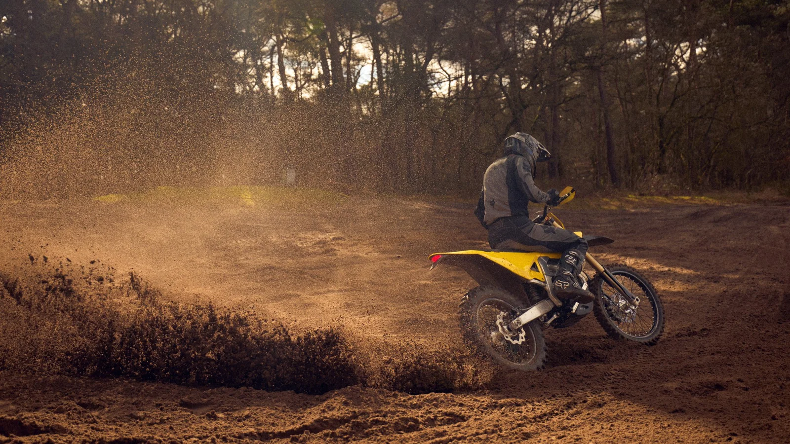 The Radian EXR electric enduro bike wheel-spinning in dirt