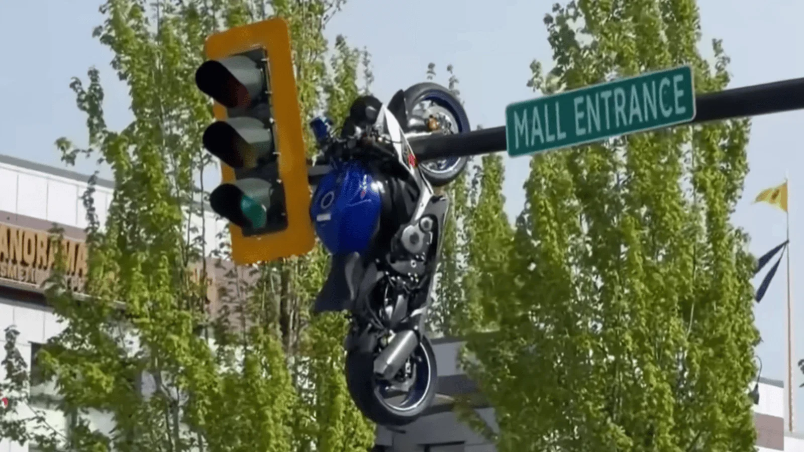 Suzuki GSX-R750 stuck in a traffic light pole.